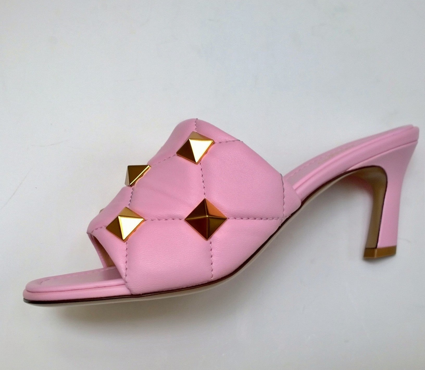 サンダル・ミュール VALENTINO Antiqued pink leather Quiltie mules Valentino Garavani Roman Stud Mule 65 Rosa Pink Leather