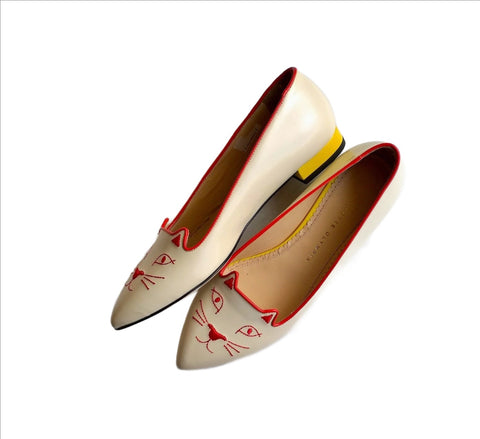 Charlotte Olympia Mid Century Kitty Cream flats with yellow heel and red accent