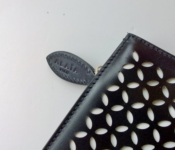 Alaia Arabesque Black Leather laser cut white backing clutch evening bag
